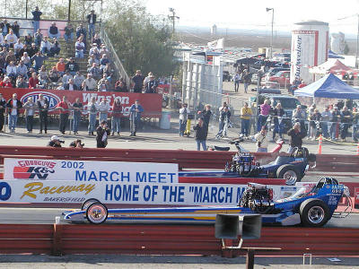 Top fuel dragsters staged