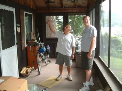 Uncle Nick and Don in the old cabin porch