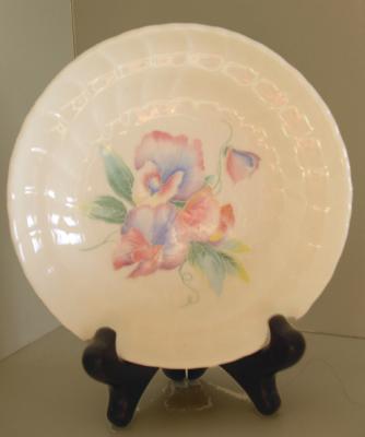 Plate on stand.