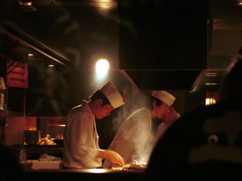 preparing food near tokyo-eki