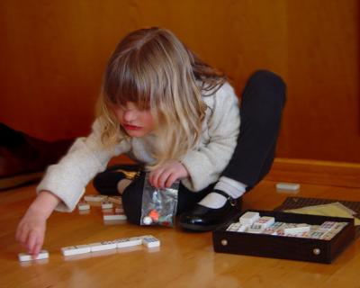 Vicki Playing Dominosby PT Kitty
