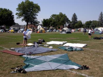 Setting up our tent on a football field in Manitowoc