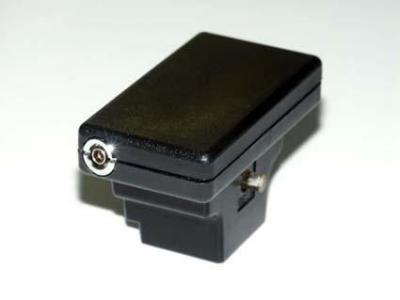PC connector socket on left side of Flash Sync Module with test button showing on back side