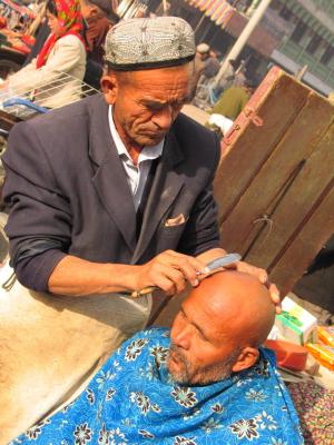 Barber at market