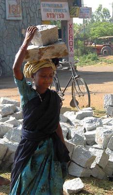Girl Carrying Rocks