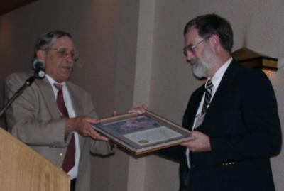 Joe Schild presenting the Azalea Society Distinguished Service Award to Bill Miller