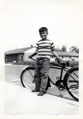 Richard leaning on bicycle, 1950 (402)