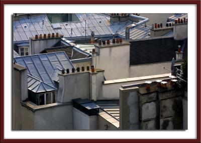...over Paris rooftops