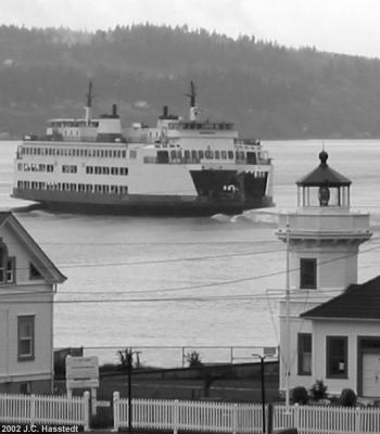 Ferry by Lighthouse in B&W
