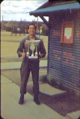 Bill Ochinero with the Volley ball trophy the Gypsy team won in 1954.