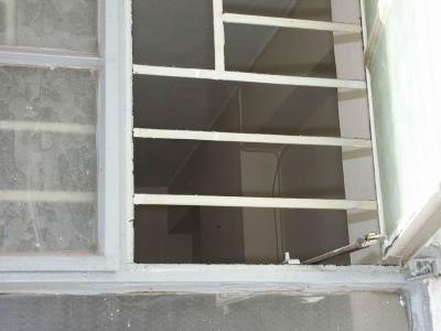 one of the windows of the ground floor unit we used to live in.