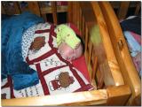 Child in crib in Annas room