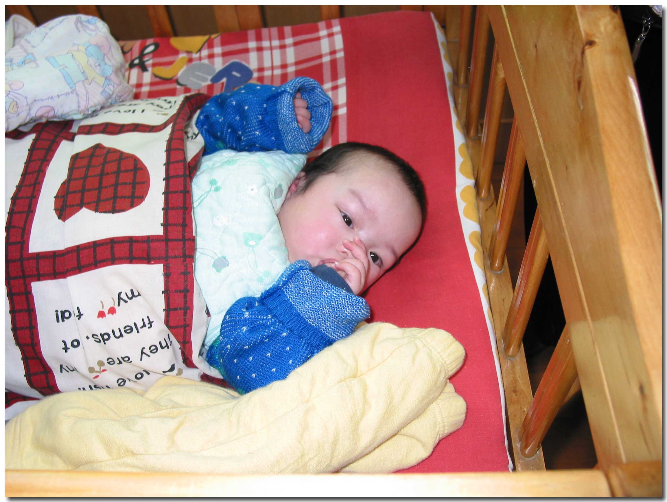 Child in crib in Annas room