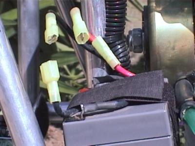 Soldered three inch leads to the battery with insulated spade connector for a sucure connection.