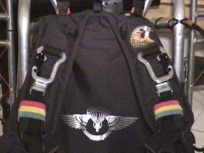 Colorful velcro holds pads sucurely centered under the harness straps. Improved comfort and virtually eliminating distracting harness adjustments are major advantages gained by the simple yet effective use of velcro.