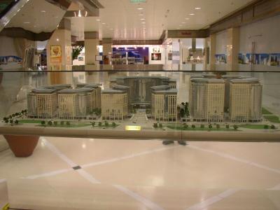 Model of a very large shoping center, hotel, apartments, and offices. It is completed and very up scale. You would not know that you where in Beijing when you go in there. It has a very good food fare.