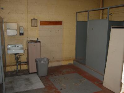 Green Room Left - Large with showers (Rough condition) Note: Grounded electrical outlet at water cooler
