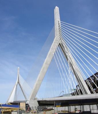 Created by Swiss architect Christian Menn, the bridge boasts two 270-foot inverted Y-shaped towers made to echo the nearby Bunker Hill Monument. This will be a 10-lane bridge (4+4+2), whose gleaming white cables form two triangles that resemble the billowing sails of a clipper ship. This cable-stayed wonder, which spans the Charles River, will be the widest bridge of its kind in the world when it opens to traffic later this year (2002).