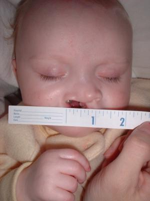 It's best to take a measurement when the child is sleeping. You are not required to take measurements but it helps to show her progress each week. Otherwise seeing your child everyday, you won't notice much of a difference.
