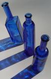 <p align=right><b>Blue Bottles</b><br><i><font size=1> photographed by </font >Faye White</i></font></p>