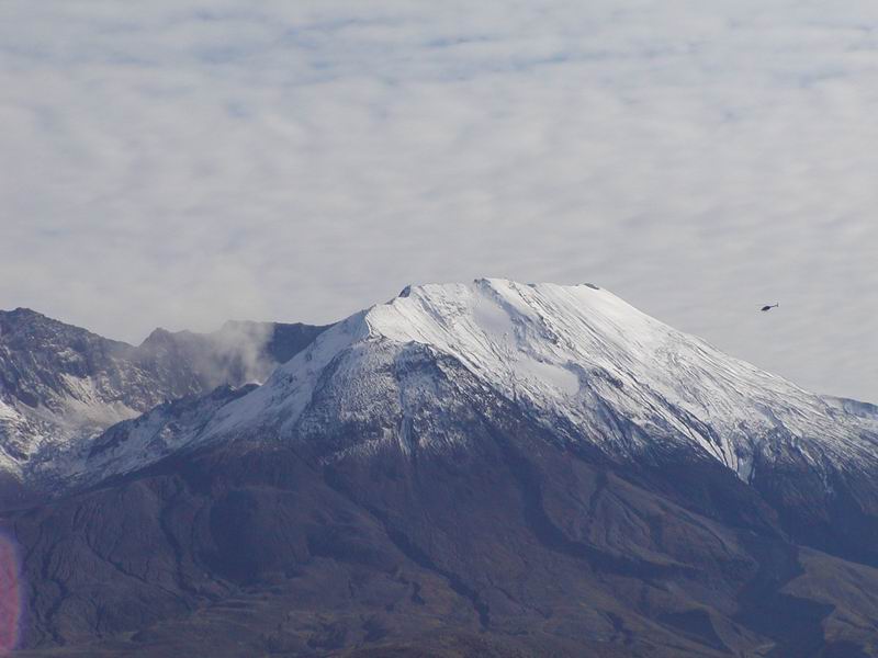 helicopter and volcano, to compare the size of it