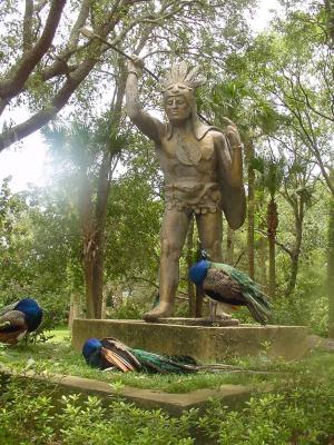 Some peacocks have found a temporary home on this statue