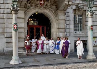 The Spectators wait on the Steps of the Town Hall