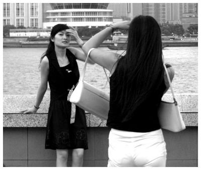 Women, handbags & digital camera