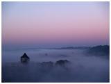 Castle emerging from the mist