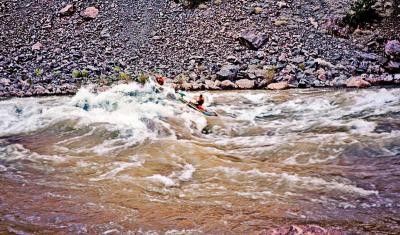Small raft going through Boucher Rapids