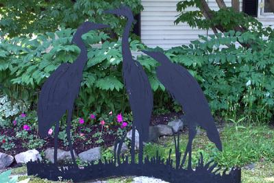 Three Steel Herons