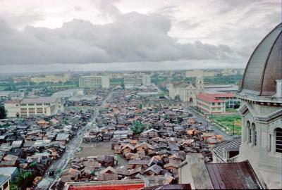Shantytown in behind Manila Cathedral, San Augustin Church on the right