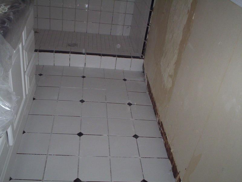 view of new bathroom floor tile