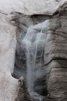 waterfall carved in glacier