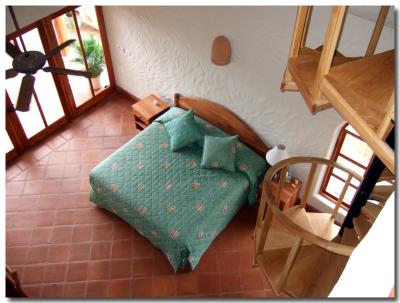 View from loft into master bedroom