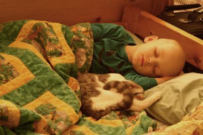 Miles sleeping with cat.jpg