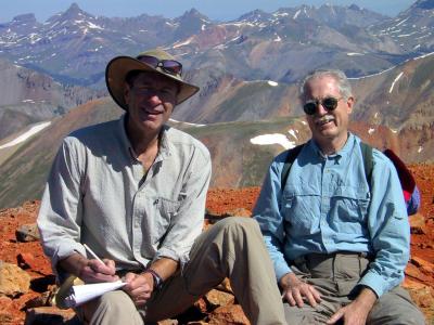 Redcloud Peak (14,034') Summit, GPS Logged in at 14,038' @ 13-JUL-05 10:02:47AM,  Jim & Kurt Signing Register