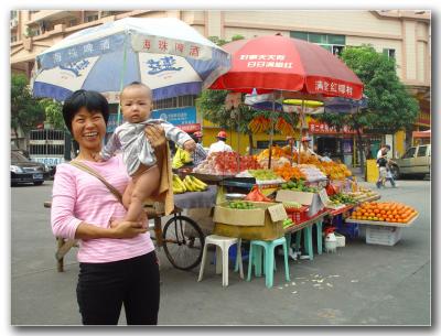 5th Placethe fruit stand lady shows me her grandson  by jrdu