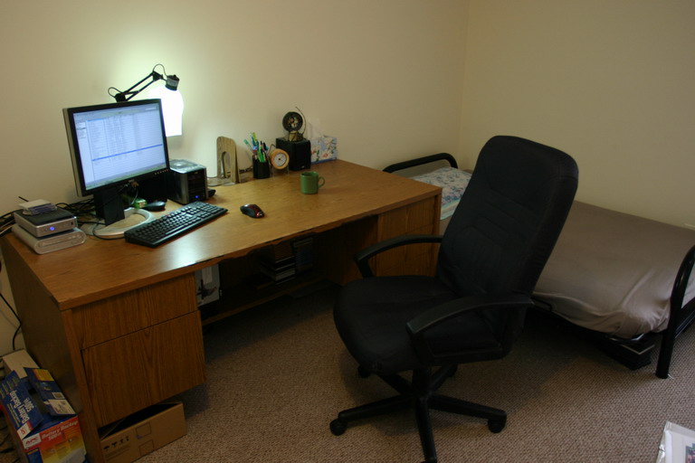 desk, chair, and desk lamp