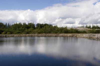 Water and clouds at quarry