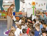 Author Nancy Hartry speaks to students and teachers in Moosonee