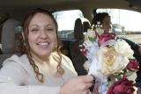 Bridesmaid in car
