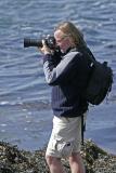 Un photographe amateur sur les rochers