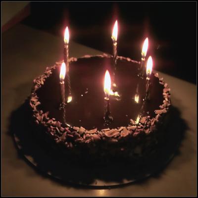 - Chocolate Layer Birthday Cake, Ringed with Almonds -