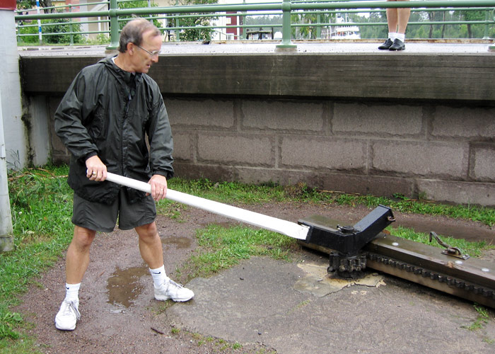Bob tries his hand at opening the gate