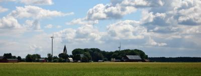 Old farm, modern windmill