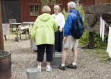 Chuck and Judy help wash clothes
