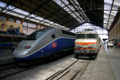 A TGV Duplex and a BB7200 at Marseille St-Charles.