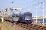 A TGV-Rseau and a modern Z23500 crossing each other in Cannes.