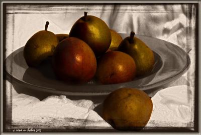 pears in orange bowl